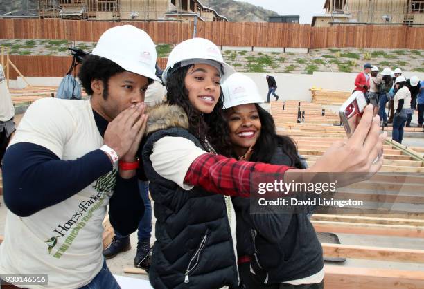 Actors Johnathan Fernandez, Chandler Kinney and Keesha Sharp pose for Instagram at the Celebs4Vets as they help Homes 4 Families build homes for...