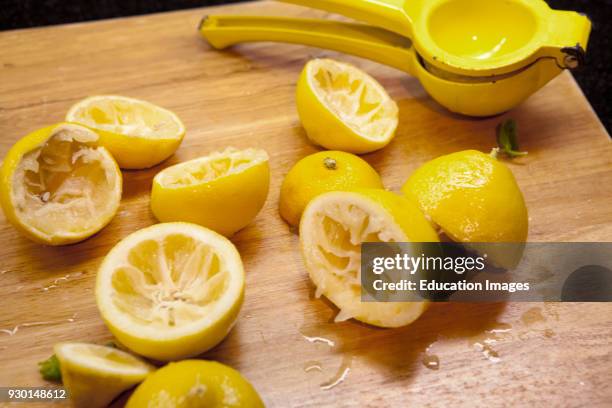 Fresh Squeezed Lemons on Cutting Board.