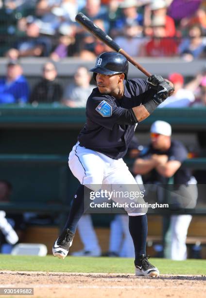 Alexi Amarista of the Detroit Tigers bats during the Spring Training game against the Toronto Blue Jays at Publix Field at Joker Marchant Stadium on...