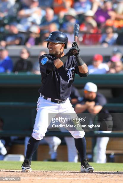 Alexi Amarista of the Detroit Tigers bats during the Spring Training game against the Toronto Blue Jays at Publix Field at Joker Marchant Stadium on...
