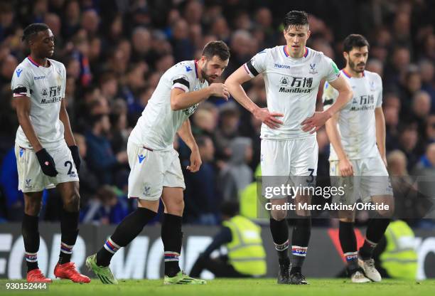 Dejected Martin Kelly of Crystal Palace alongside team mates, Aaron Wan-Bissaka, James McArthur and James Tomkins during the Premier League match...