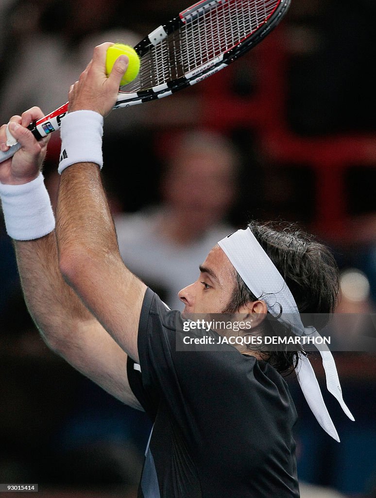 Chilean Fernando Gonzalez jokes with his