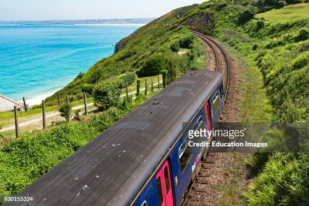 Train On The Coast Line At Carbis Bay Near In Cornwall, England, Britain, UK.