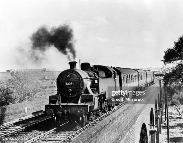 Leicester based tank engine headed for its home city over the viaduct at Rugby, circa 1964.