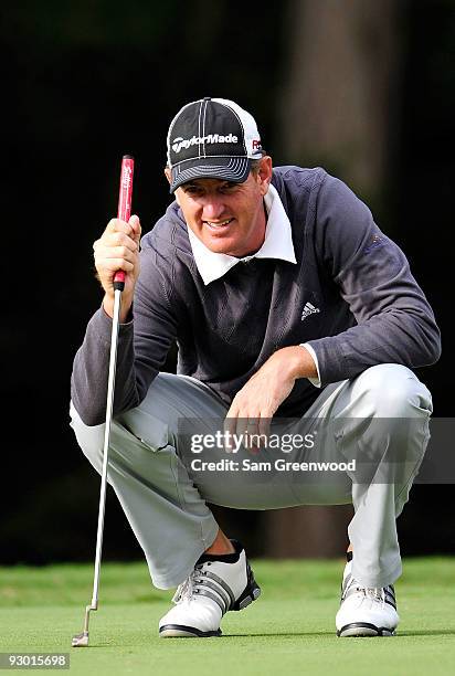 Greg Owen looks over a shot on the 8th hole during the first round of the Children's Miracle Network Classic at the Disney Palm and Magnolia courses...