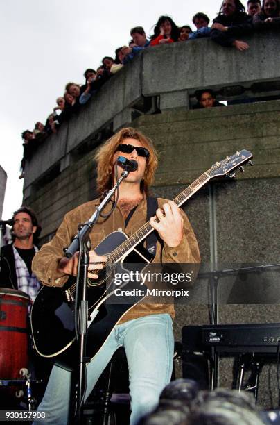 Bon Jovi brought the walkways of London's South Bank to a standstill when they played an impromptu mini-concert outside the Queen Elizabeth Hall,...