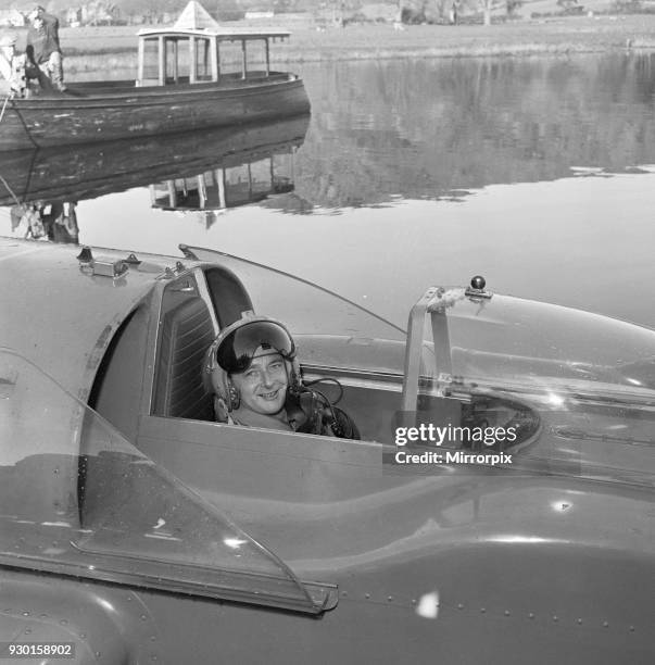 Donald Campbell, at Coniston Water, 7th November 1957. Donald Campbell, pictured after breaking his own world record at Coniston Water, by averaging...