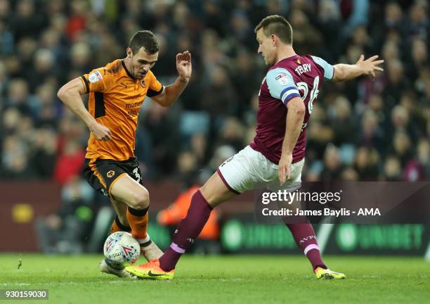 Leo Bonatini of Wolverhampton Wanderers and John Terry of Aston Villa during the Sky Bet Championship match between Aston Villa and Wolverhampton...