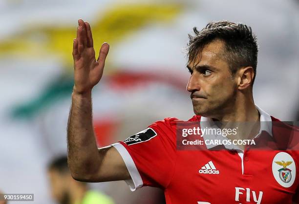 Benfica's Brazilian forward Jonas celebrates a goal during the Portuguese league football match between SL Benfica and CD Aves at the La Luz stadium...