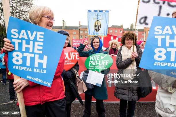 Protesters hold an anti-abortion placards during the All-Ireland Rally for Life - march to Save the 8th amendment to the Irish constitution which...