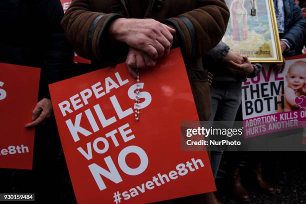 Protesters hold an anti-abortion placards during the All-Ireland Rally for Life - march to Save the 8th amendment to the Irish constitution which...