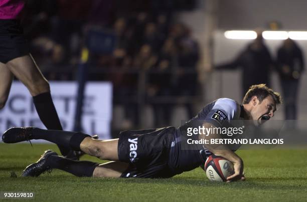 Toulon's French winger Vincent Clerc scores his 100th try during the French Top 14 rugby union match between Toulon and Agen on March 10 at the Mayol...