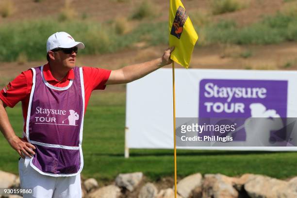 Caddie in action during the final round of the Sharjah Senior Golf Masters presented by Shurooq played at Sharjah Golf & Shooting Club on March 10,...