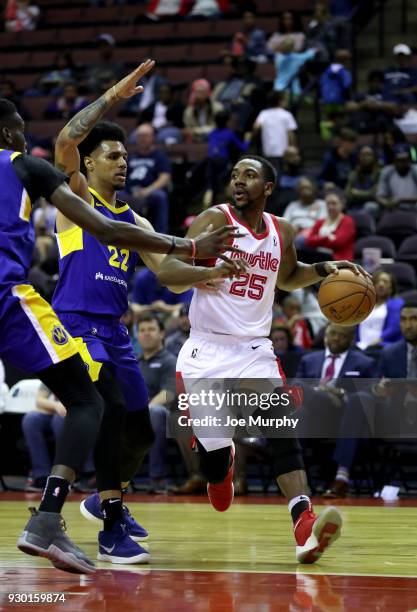 Marquis Teague of the Memphis Hustle handles the ball against Michael Gbinije of the Santa Cruz Warriors during an NBA G-League game on March 10,...