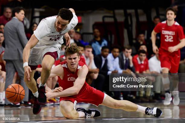 Corey Johnson of the Harvard Crimson beats out Stone Gettings of the Cornell Big Red for the ball during the second half of a semifinal round matchup...