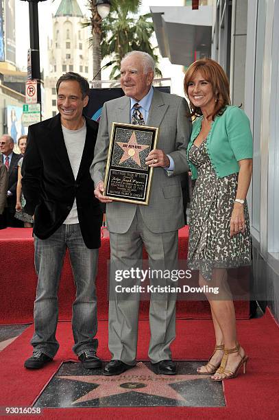 Harvey Levin and Judge Marilyn Milian pose with Judge Joseph Albert Wapner as he receives a star on the Hollywood Walk Of Fame on November 12, 2009...