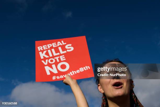 Protesters hold an anti-abortion placards during the All-Ireland Rally for Life - march to Save the 8th amendment to the Irish constitution which...