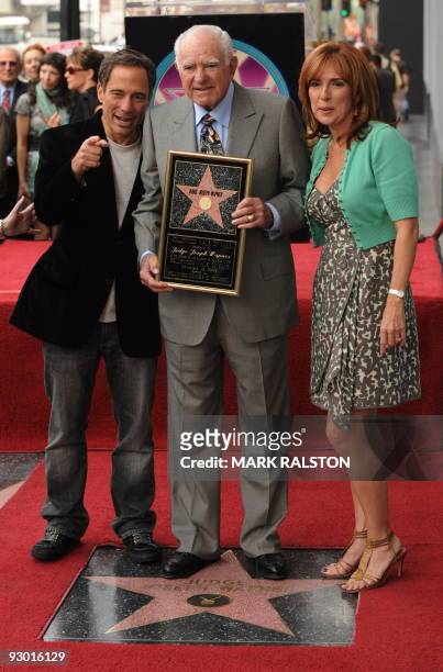 Judge Joseph A. Wapner poses with a copy of his star beside Harvey Levin from the website TMZ and Judge Marilyn Milian after he was honored with a...