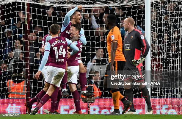 James Chester of Aston Villa celebrates after scoring a goal to make it 2-1 during the Sky Bet Championship match between Aston Villa and...