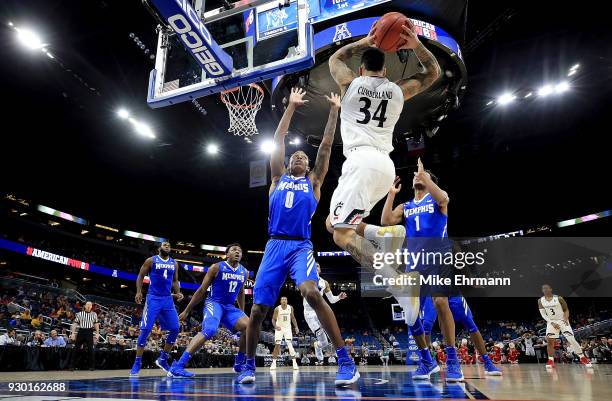 Jarron Cumberland of the Cincinnati Bearcats passes during a semifinal game of the 2018 AAC Basketball Championship against the Memphis Tigers at...