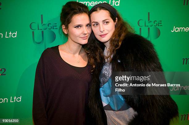 Virginie Ledoyen and Amira Casar attend the Close Up Festival 2nd Edition "Take it Irish" Party at Mk2 Bibliotheque on November 12, 2009 in Paris,...
