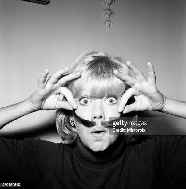 Hayley Mills wearing a genuine Dali imitation moustache, which can be bought for 12s, 6d, 20th September 1964.