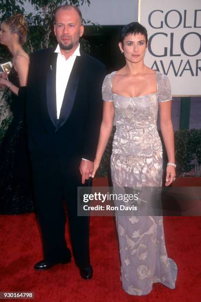 Actor Bruce Willis and wife actress Demi Moore attend the 54th Annual Golden Globe Awards on January 19, 1997 at the Beverly Hilton Hotel in Beverly...