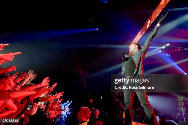 Kasabian lead singer Tom Meighan performs on stage at SECC on November 12, 2009 in Glasgow, Scotland.