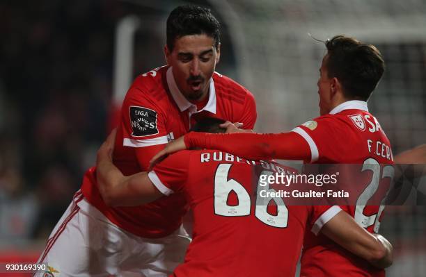 Benfica defender Ruben Dias celebrates with teammates after scoring a goal in action during the Primeira Liga match between SL Benfica and CD Aves at...