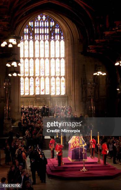 Mourners paying their last respects, file past the coffin of Queen Elizabeth, the Queen Mother which lies in state at Westminster Hall in central...