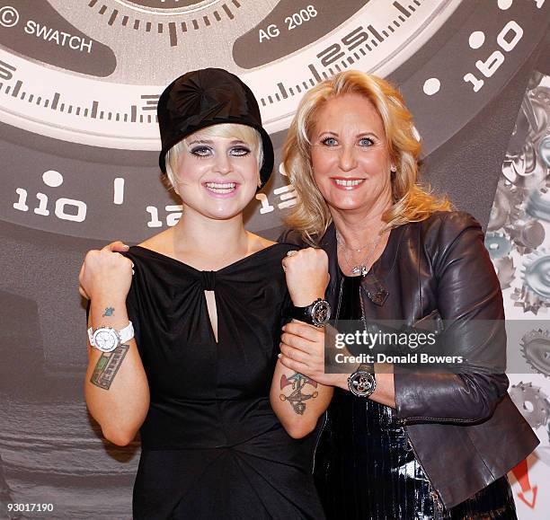 Television personality Kelly Osbourne and Global Swatch President Madame Arlette-Elsa Emch attend the Swatch Times Square flagship store grand...