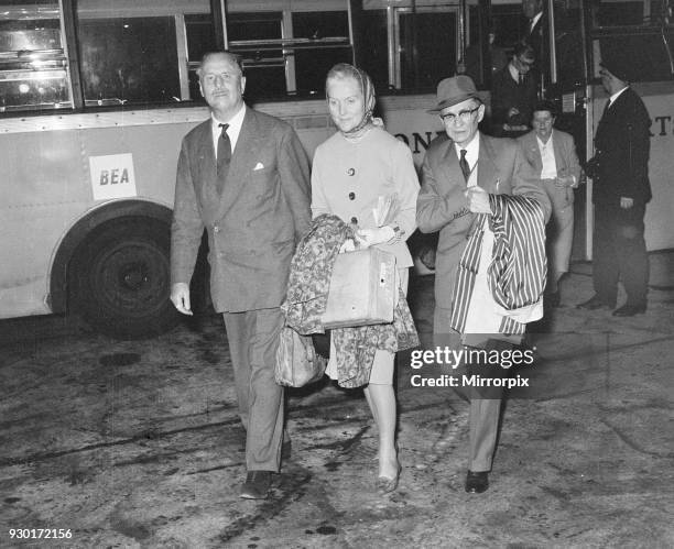 Oswald Mosley and wife head back home to France, London Heathrow Airport, Wednesday 1st August 1962.