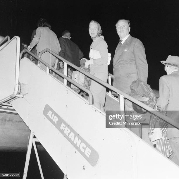 Oswald Mosley and wife head back home to France, London Heathrow Airport, Wednesday 1st August 1962.