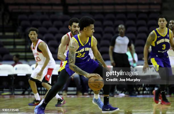 Michael Gbinije of the Santa Cruz Warriors handles the ball against the Memphis Hustle during an NBA G-League game on March 10, 2018 at Landers...
