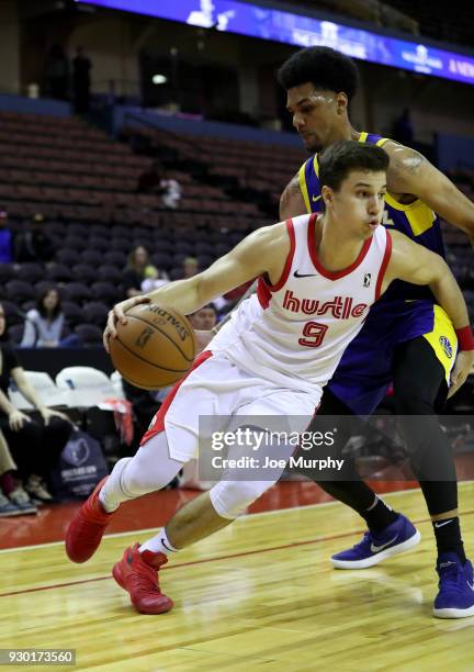 Dusty Hannahs of the Memphis Hustle handles the ball against the Santa Cruz Warriors during an NBA G-League game on March 10, 2018 at Landers Center...