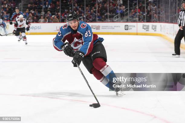 Matt Nieto of the Colorado Avalanche controls the puck during the first period of the game against the Arizona Coyotes at the Pepsi Center on March...