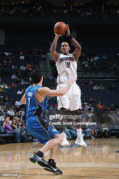 Raja Bell of the Charlotte Bobcats takes a jump shot against J.J. Redick of the Orlando Magic during the game on November 10, 2009 at the Time Warner...