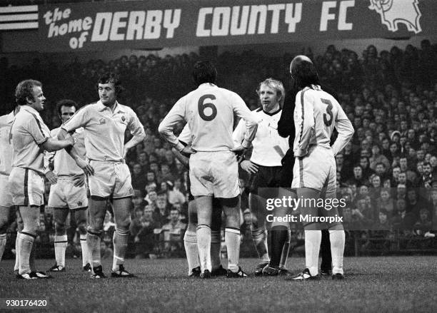 English League Division One match at the Baseball Ground. Derby County 3 v Leeds United 2. Francis Lee and Norman Hunter stare at each other after...