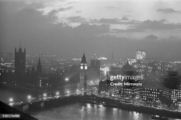 Views from the South Bank at night, showing Houses of Parliament and Big Ben, 13th December 1963.