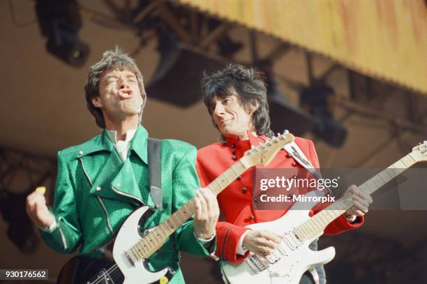 The Rolling Stones performing at Wembley Stadium, London, England. Mick Jagger and Ronnie Wood, 4th July 1990.