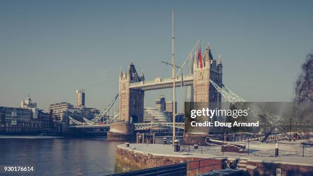 a snowy tower bridge and st katherines dock, london, uk - doug armand ストックフォトと画像