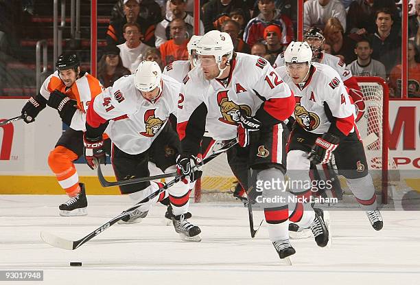 Mike Fisher of the Ottawa Senators skates with the puck against the Philadelphia Flyers at the Wachovia Center on November 12, 2009 in Philadelphia,...