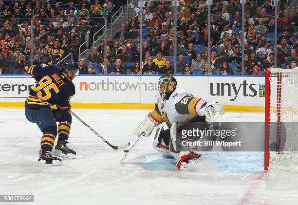 Justin Bailey of the Buffalo Sabres scores a third period goal against Marc-Andre Fleury of the Vegas Golden Knights during an NHL game on March 10,...