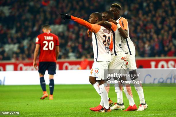 Jordan Ikone and Jerome Roussillon of Montpellier celebrate his goal during the Ligue 1 match between Lille OSC and Montpellier Herault SC at Stade...