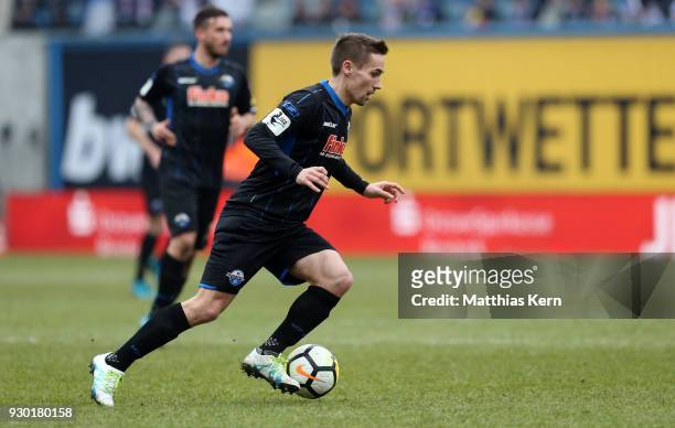 Philipp Klement of Paderborn runs with the ball during the 3.Liga match between FC Hansa Rostock and SC Paderborn 07 at Ostseestadion on March 10,...