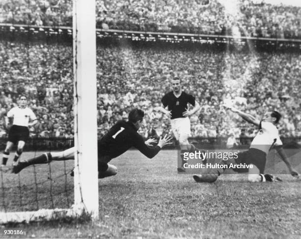 Max Morlock of West Germany scores his countries first goal of the match to get them back in the game during the FIFA World Cup Final against Hungary...