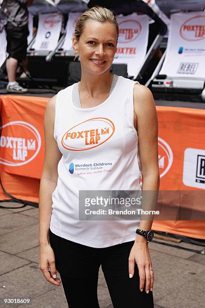 Sarah Murdoch takes part in The Foxtel Lap 2009, whereby teams of 20 compete to run or walk as many 100m laps for chairty, at Martin Place on...