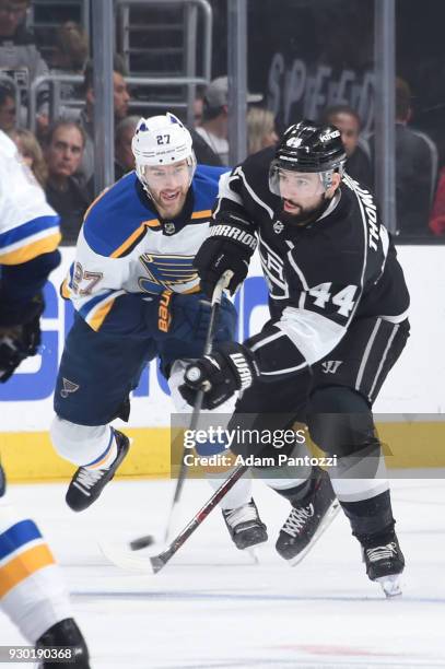 Nate Thompson of the Los Angeles Kings handles the puck against Alex Pietrangelo of the St. Louis Blues at STAPLES Center on March 10, 2018 in Los...
