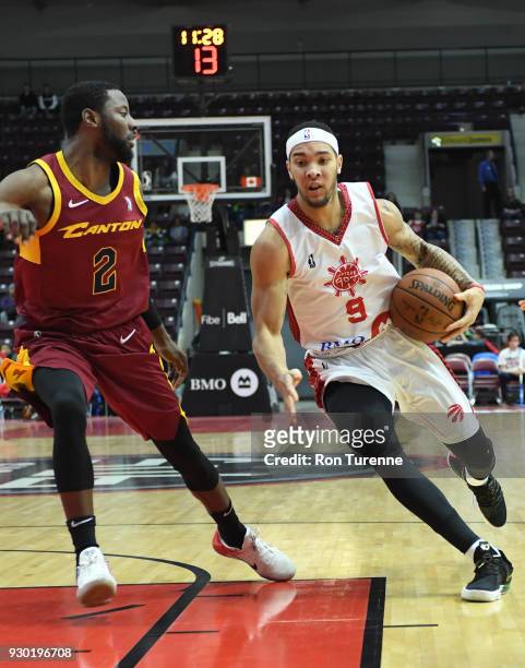 Davion Berry of the Raptors 905 handles the ball against Scoochie Smith of the Canton Charge during an NBA G-League game on March 10, 2018 at the...