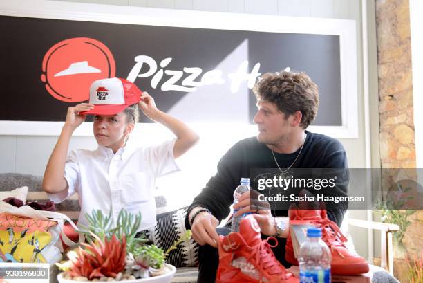 Actors Hayley Law and Brett Dier from the film "The New Romantic" attend the Pizza Hut Lounge at the 2018 SXSW Film Festival on March 10, 2018 in...